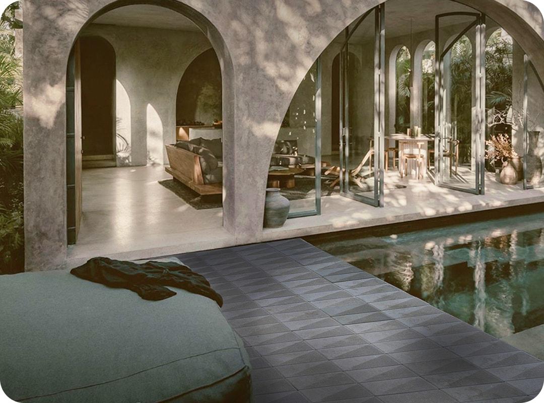 Modern residential space with pool and arched openings