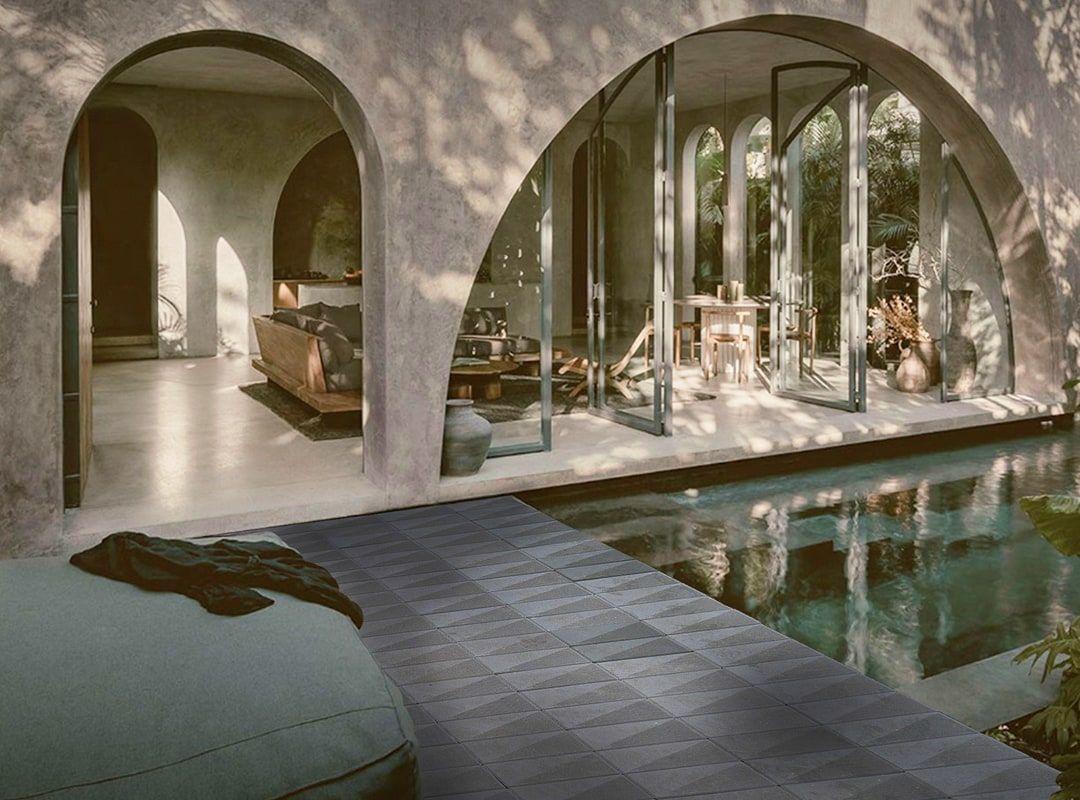 Modern residential space with pool and arched openings